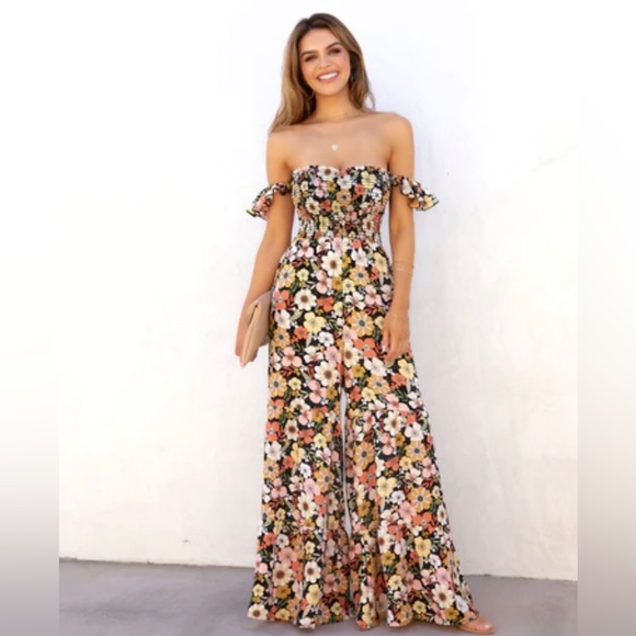 Vici Pants - Vici onyx floral pocketed jumpsuit.